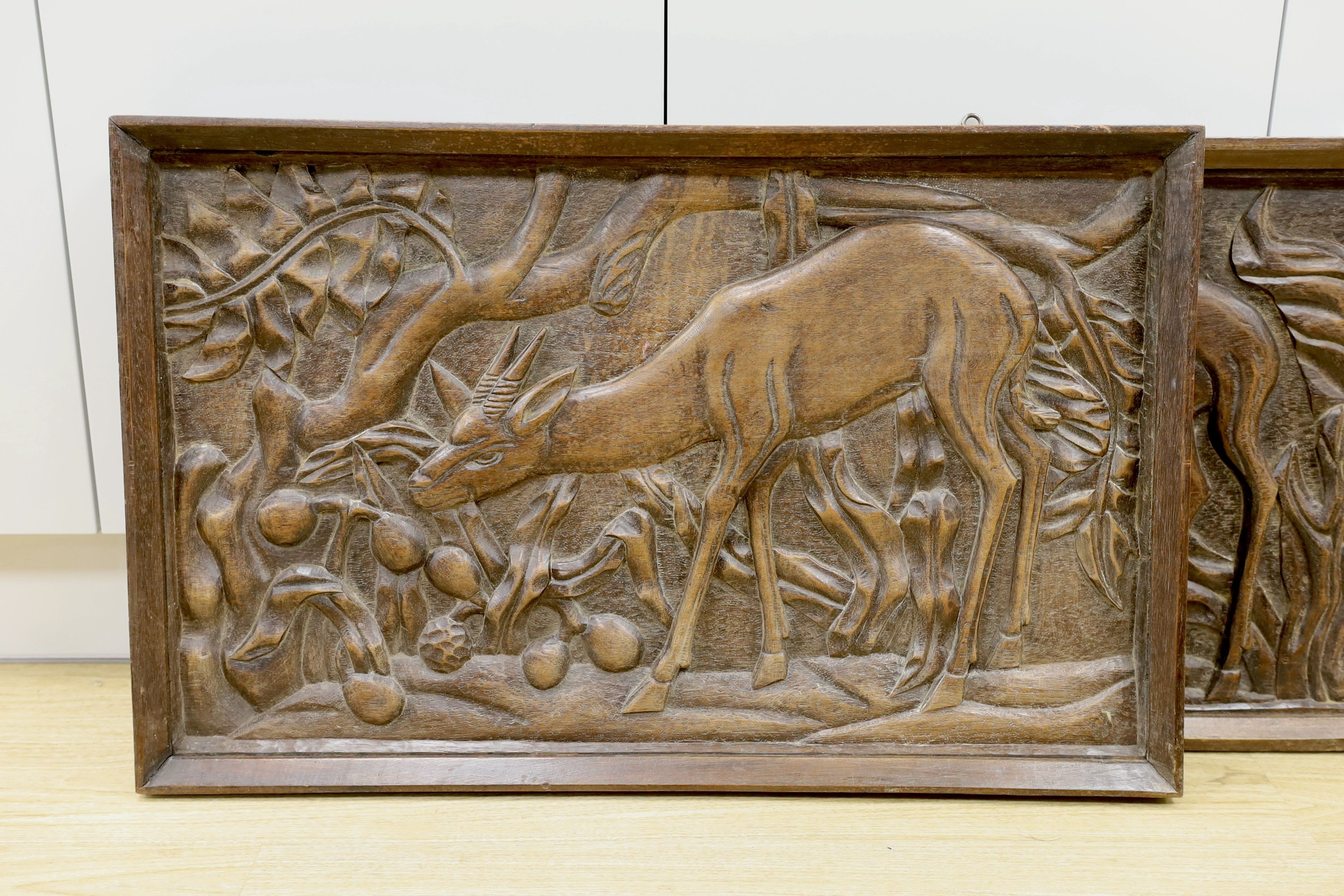 A pair of 1930's carved oak panels of deer grazing, 84 cms wide x 52 cms high. - Image 2 of 3