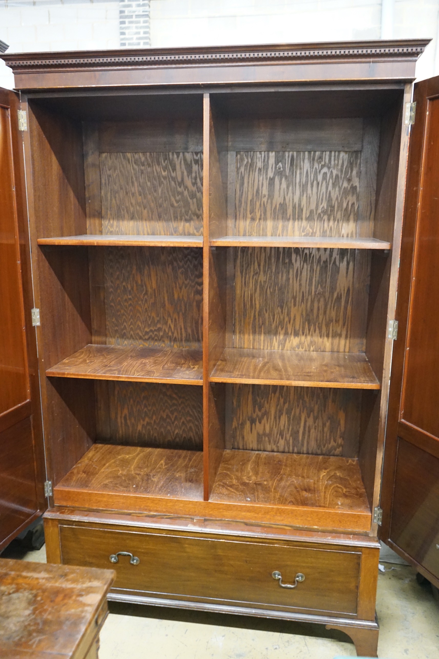 A 1920's mahogany press cupboard with part dummy drawer front over a single drawer, width 120cm, - Image 2 of 2