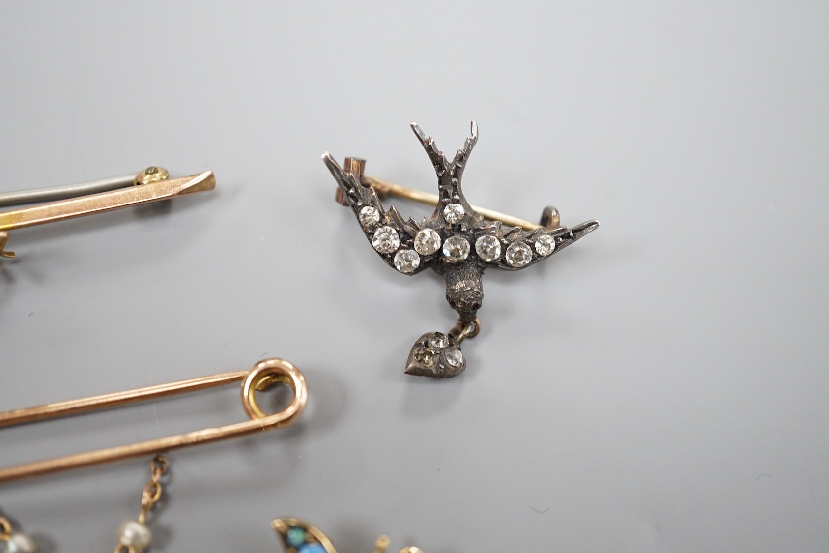 A modern 9ct gold and opal set bug brooch, 24mm, a paste set white metal swallow pendant and similar - Image 6 of 6