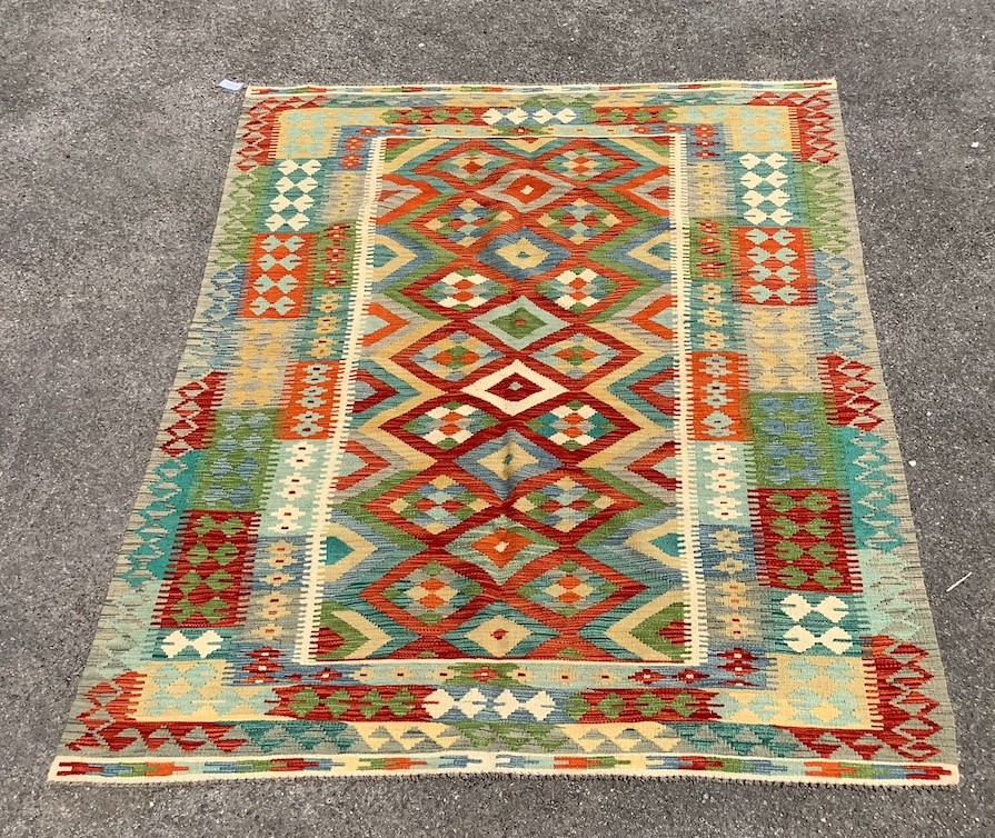 An Anatolian design polychrome flatweave Kilim carpet, 238 x 177cm