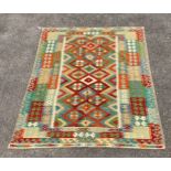 An Anatolian design polychrome flatweave Kilim carpet, 238 x 177cm