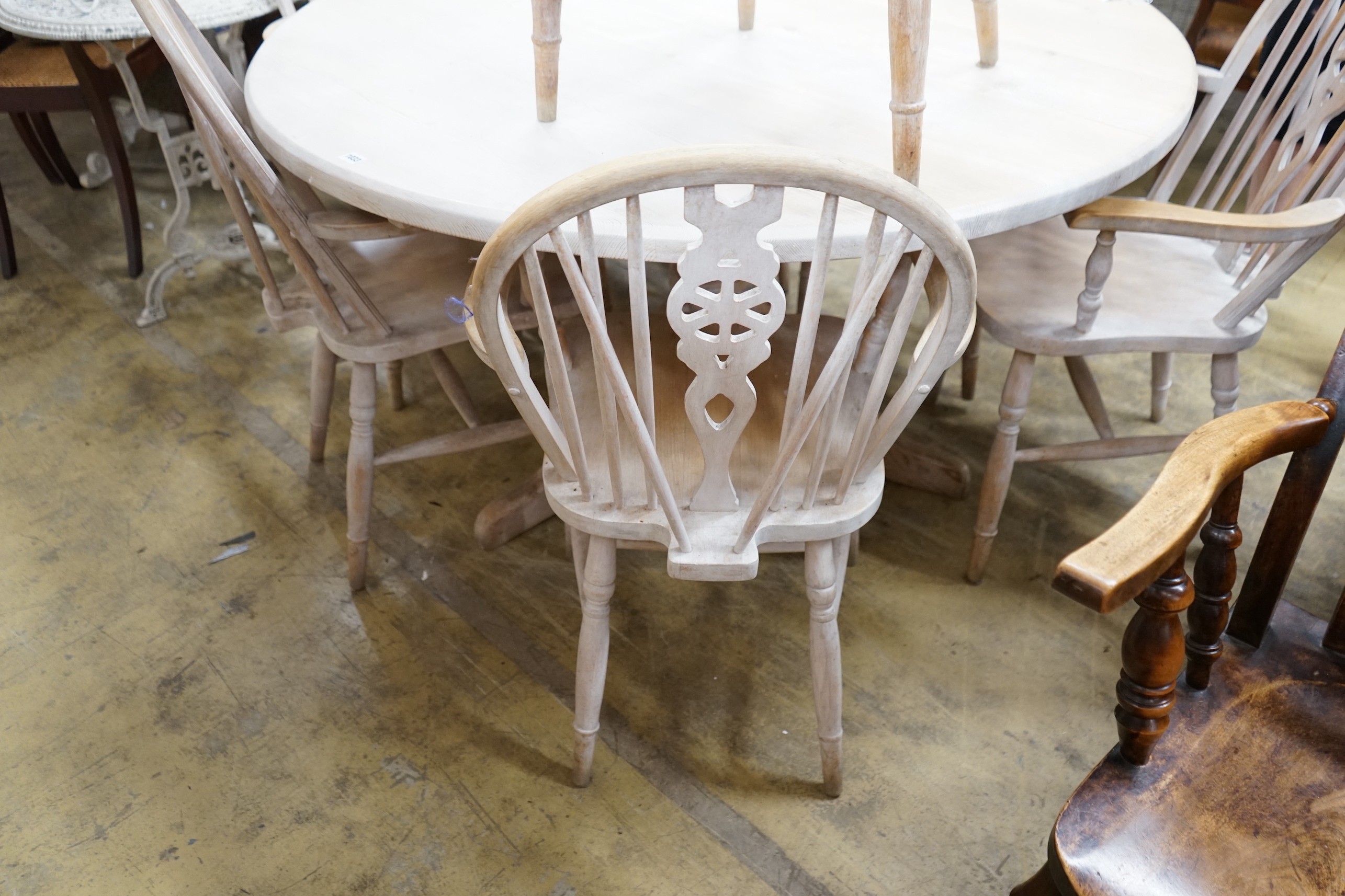 A set of eight Victorian style limed beech Windsor wheelback elbow chairs - Image 2 of 4