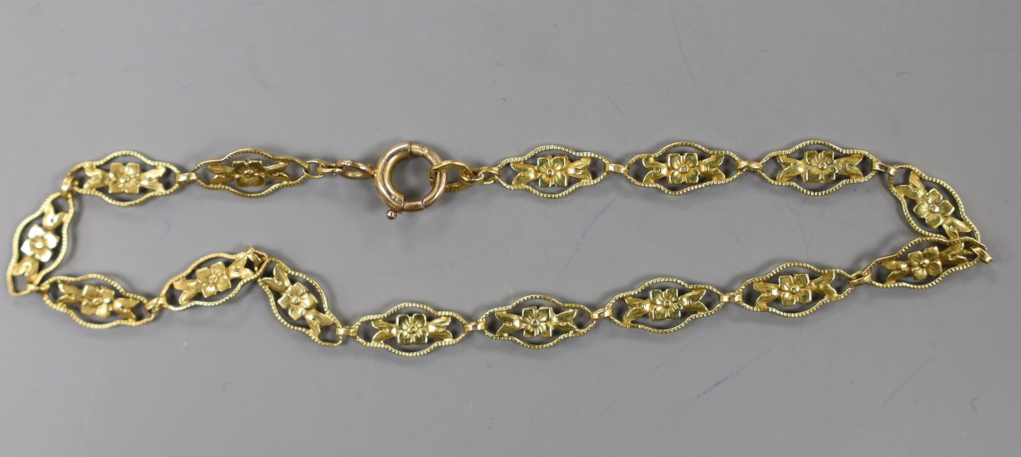 A modern 750 yellow metal pierced link bracelet, 18cm, 3.7 grams. - Image 2 of 2