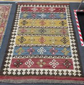 A Kilim polychrome flat weave carpet, 240 x 170cm