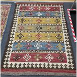 A Kilim polychrome flat weave carpet, 240 x 170cm