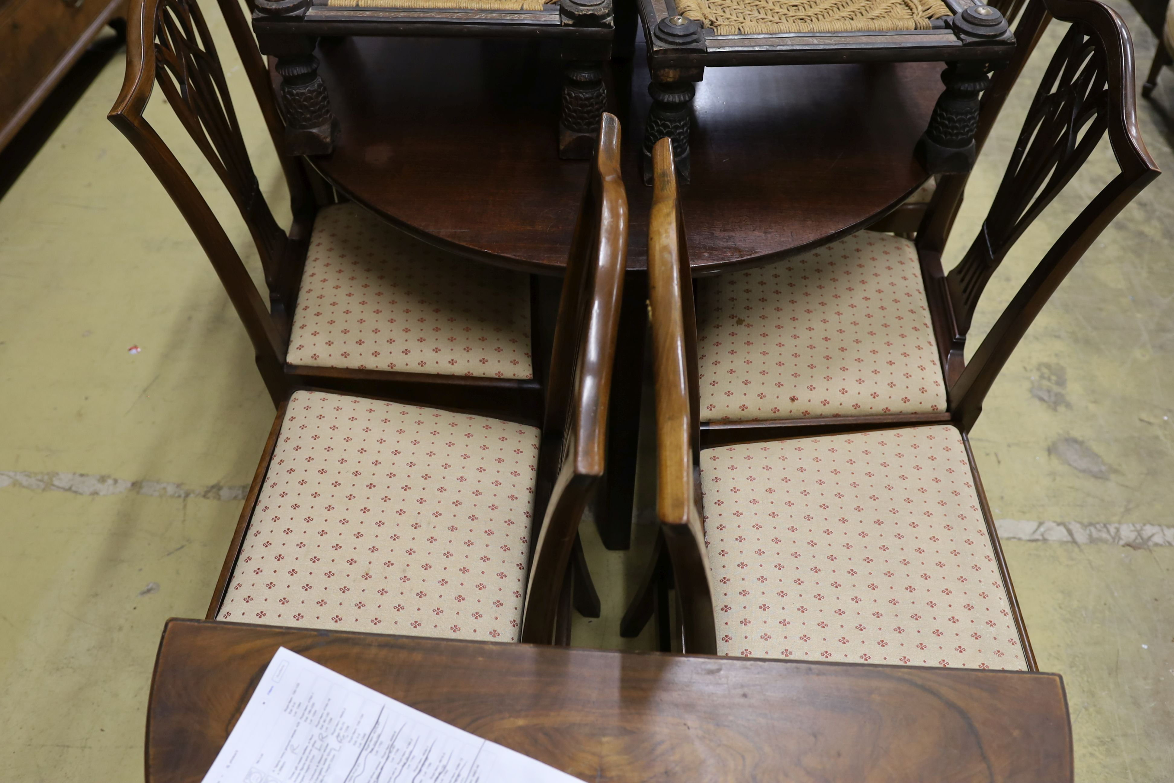 A set of nine George III and later mahogany dining chairs with pierced splats and upholstered drop - Image 2 of 3