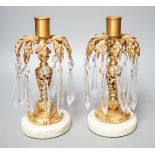 A pair of gilt metal and glass lustre drop candlesticks - 22cm tall