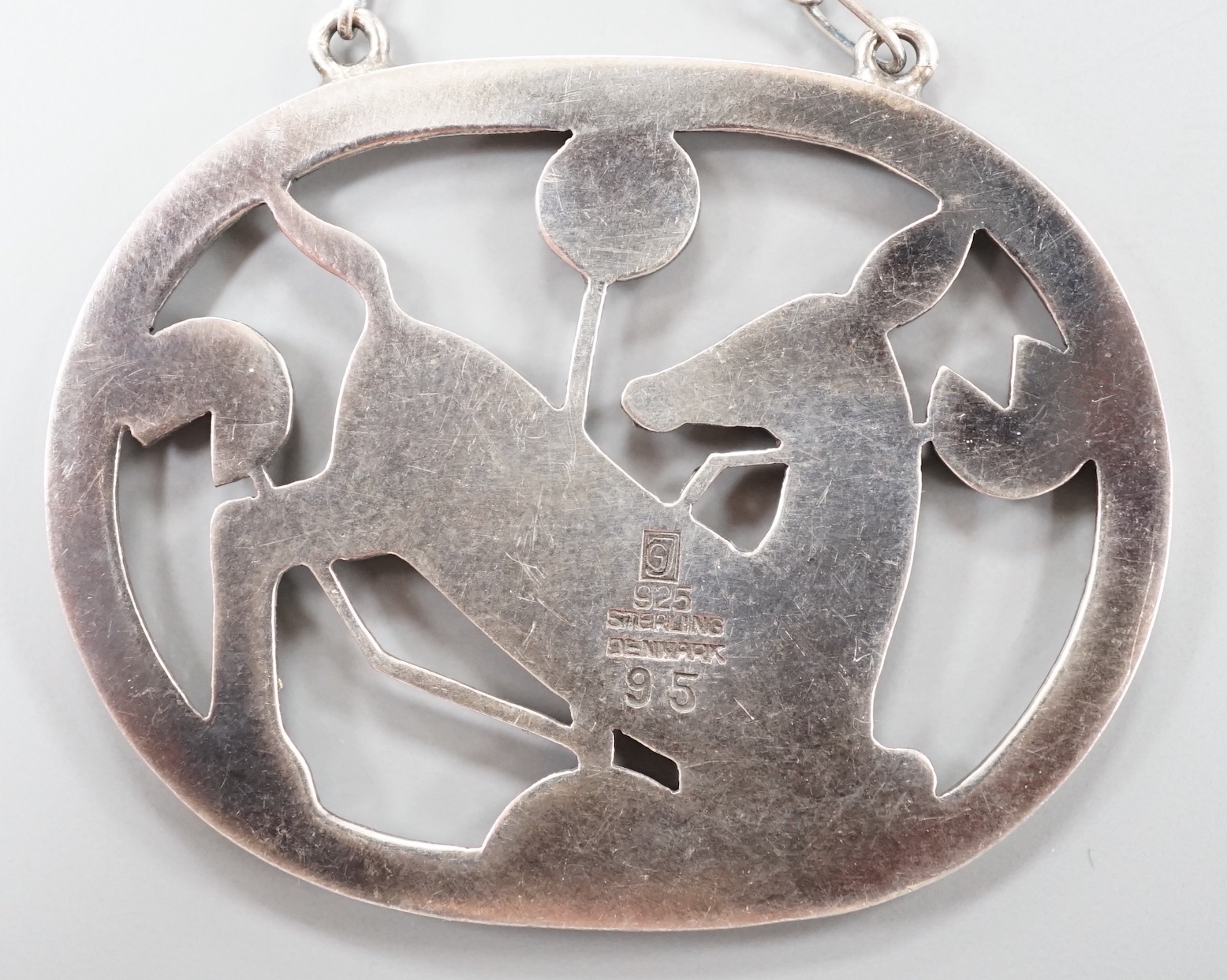 A Georg Jensen sterling 'kneeling deer' oval pendant necklace, no. 95, pendant 42mm, chain 53cm. - Image 2 of 2