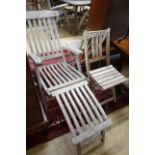 A weathered teak garden steamer chair and two folding garden chairs