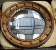 A Regency convex wall mirror, diameter 56cm