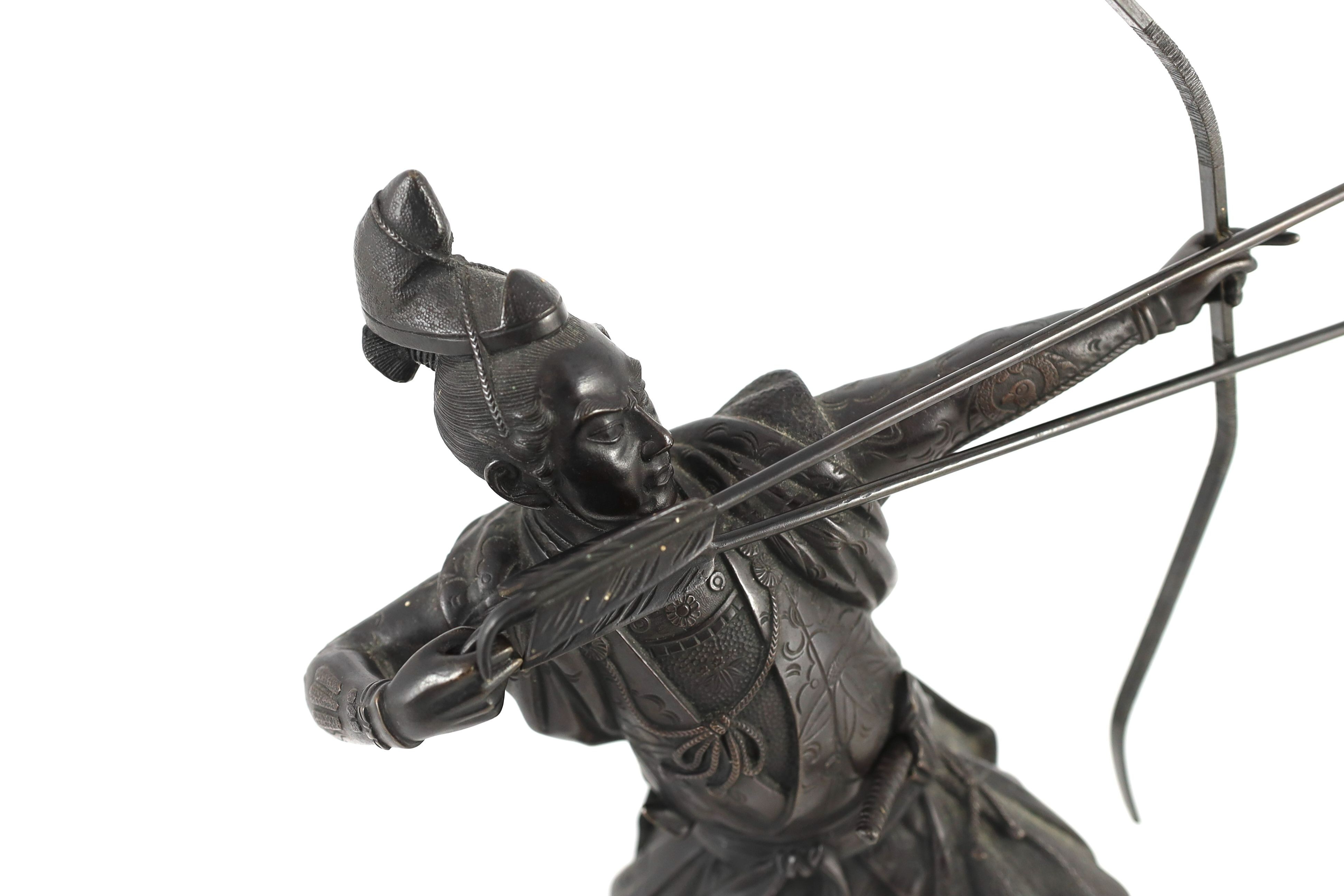 A Japanese bronze figure of a kneeling archer, Meiji period, signed to a raised tablet ‘…zan’ 40 - Image 2 of 7