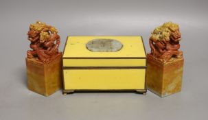 Two soapstone lion dogs and yellow enamelled box