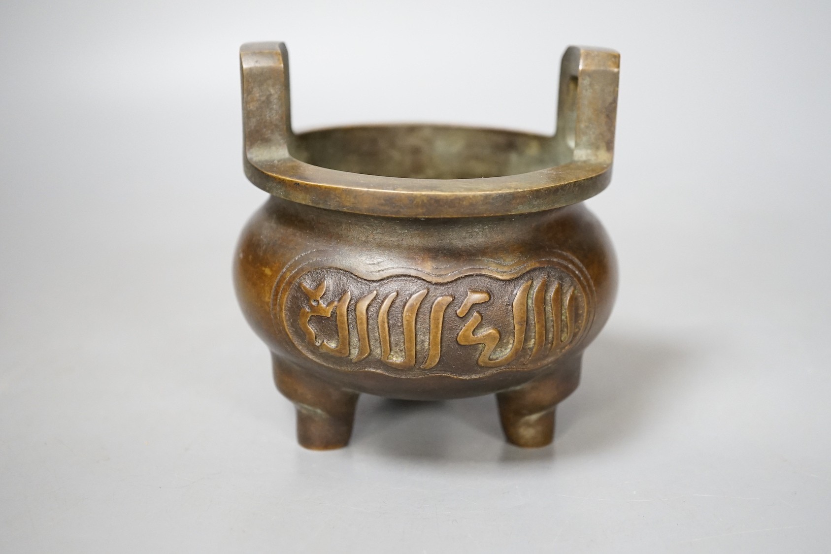 A Chinese bronze tripod Islamic market censer, Xuande mark - 13cm tall - Image 3 of 4