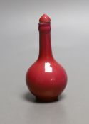 A Chinese ruby ground snuff bottle and stopper, Yongzheng mark but 19th century - 8cm tall