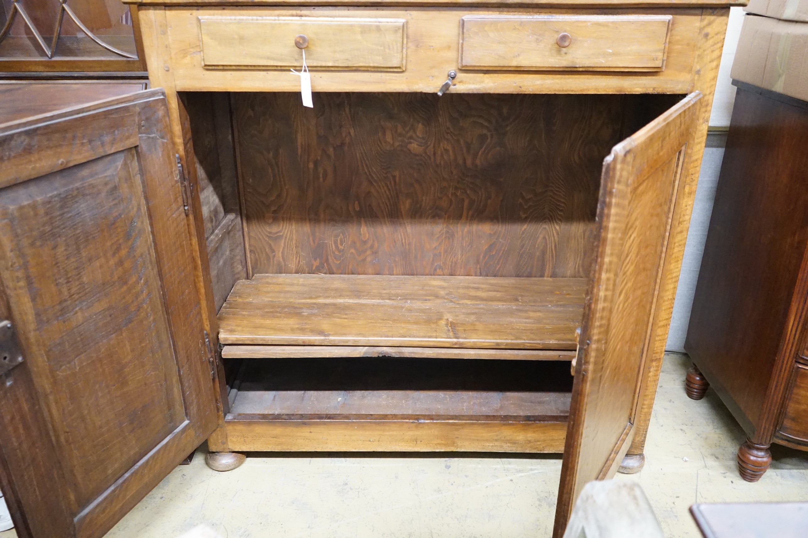 A late18th century continental fruitwood two drawer side cabinet, width 128cm, depth 47cm, height - Image 3 of 3