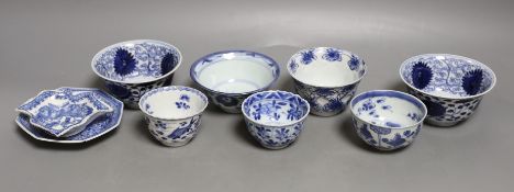 A group of Chinese blue and white tea bowls, 18th century a saucer and a in English porcelain leaf