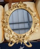 A Victorian oval carved giltwood wall mirror, width 49cm, height 66cm