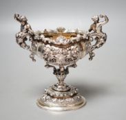 A late Victorian ornate small silver presentation centrepiece, by Carrington & Co, London, 1893,