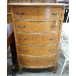 An early 20th century oak bow front tall chest, width 76cm, depth 49cm, height 123cm