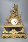 A 19th century French bronze and ormolu mounted black marble mantel clock,48cms high.