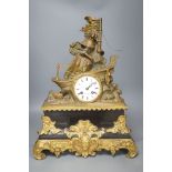 A 19th century French bronze and ormolu mounted black marble mantel clock,48cms high.