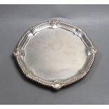 A George II silver salver, with gadrooned and shell border (foot repair), Edward Wakelin, London,