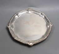 A George II silver salver, with gadrooned and shell border (foot repair), Edward Wakelin, London,