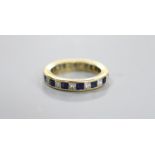 A yellow metal, sapphire and diamond set full eternity ring, the side of the shank engraved 'Thou