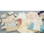 Four French style dolls dresses, average 22cm, a French silk coat and bonnet, 18cm and a small