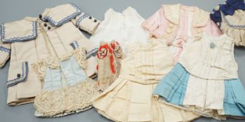 Four French style dolls dresses, average 22cm, a French silk coat and bonnet, 18cm and a small