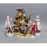 A pair of KPM style porcelain figures of a maiden and a gallant, 22cm, a Capo di Monte figure group,