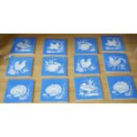 A collection of twelve Mintons China Works blue and white bird tiles,5cms x 5cms square (each