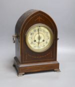 An early 20th century mahogany inlaid dome topped mantel clock,30 cms high.