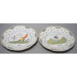 A pair of French faience plates - ‘la nation’, 1790, and ‘je suis las de les Porter’, 1791 - 24cm