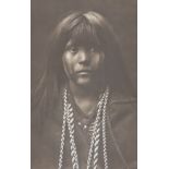 A reprinted black and white photograph of Native American girl, after Curtis, 40 x 25cm