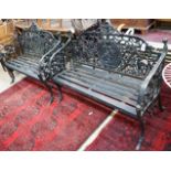 A pair of Victorian style painted cast iron garden benches, length 130cm, depth 44cm, height 97cm