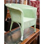 A Lloyd Loom elbow chair, later painted
