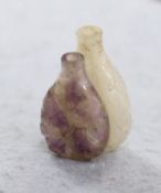 A 19th century Chinese quartz double snuff bottle, 6cm, the carver skilfully incorporating the