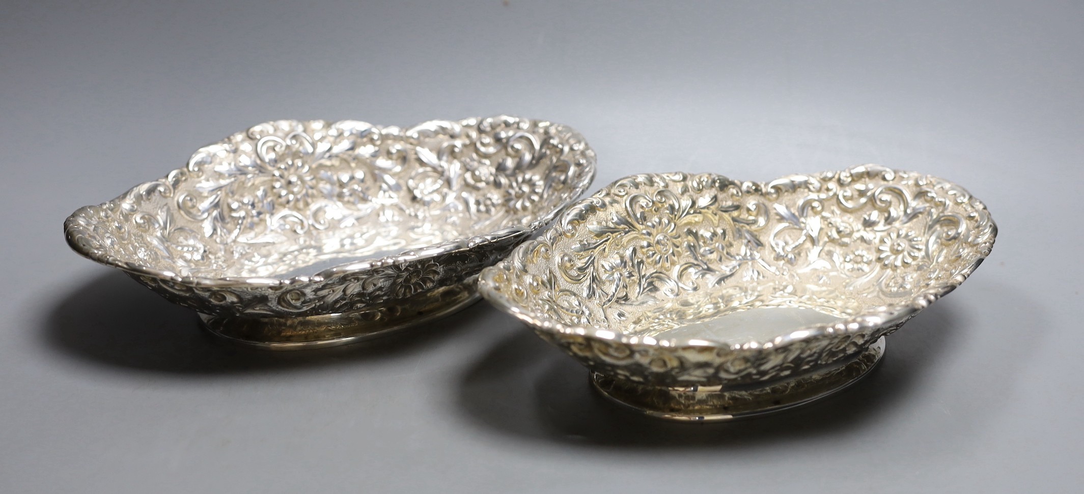 A pair of late Victorian Scottish repousse silver oval dishes, Hamilton & Inches, Edinburgh, 1900,
