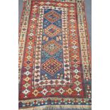 A Kazak blue ground rug, 152 x 95cm