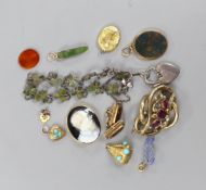 A small group of Victorian and later jewellery including a 1920's silver 'shamrock' bracelet, garnet