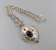 A modern silver and cabochon gem set pendant, on an oval link chain, by Michael Allen Bolton,