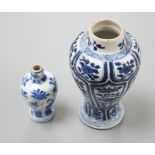 Two Chinese Kangxi blue and white vases, the smallest marked ‘yu’ (jade),tallest 15 cms high.