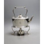 An Edwardian Scottish silver oval tea kettle, on stand with burner, Hamilton & Inches, Edinburgh,