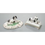 Two Staffordshire porcelain models of recumbent king Charles spaniel‘s, c.1835-50, largest 8.2 cm