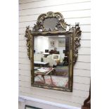 An 18th century Italian giltwood mirror, width 90cm, height 115cm