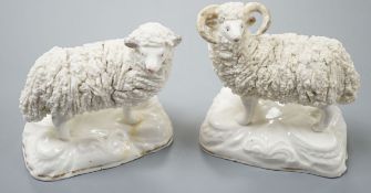 A pair of large Staffordshire porcelain figures of a ewe and a ram, c.1835–50, 10.5 and 11 cm