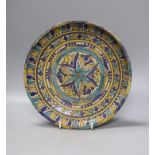 A Moroccan pottery dish, diameter 26cm