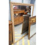 A reproduction gilt framed wall mirror, width 103cm, height 135cm