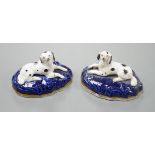 A pair of Samuel Alcock porcelain models of recumbent king Charles spaniels, c.1835-40, impressed